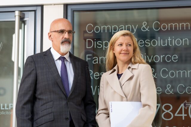 Jo W and Martyn outside office