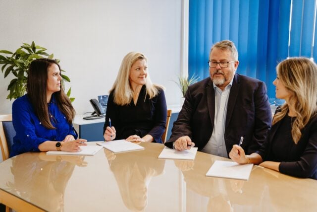 Commercial Property Team looking at each other