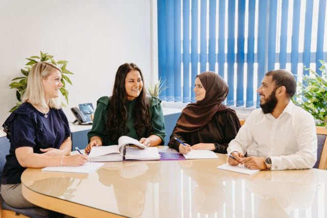 Manzurul, Hazara, Anne and Trudi looking at each other