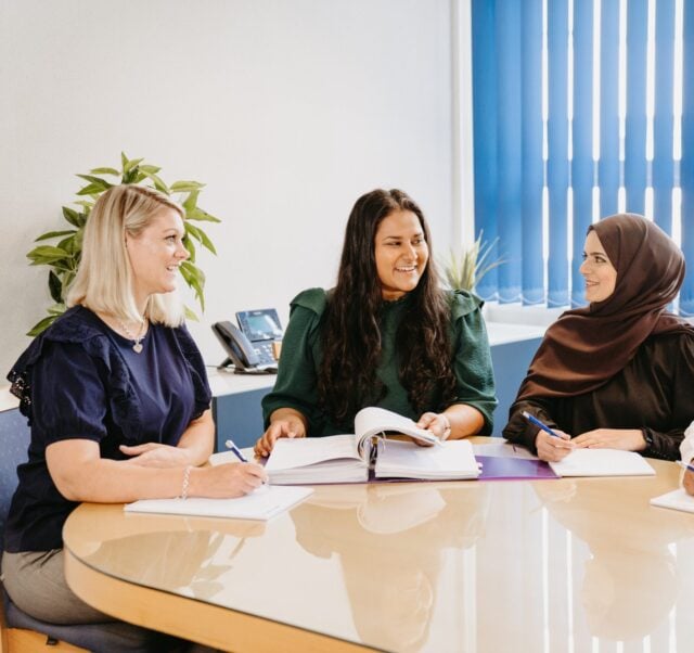 Manzurul, Hazara, Anne and Trudi looking at each other