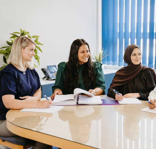 Manzurul, Hazara, Anne and Trudi looking at each other