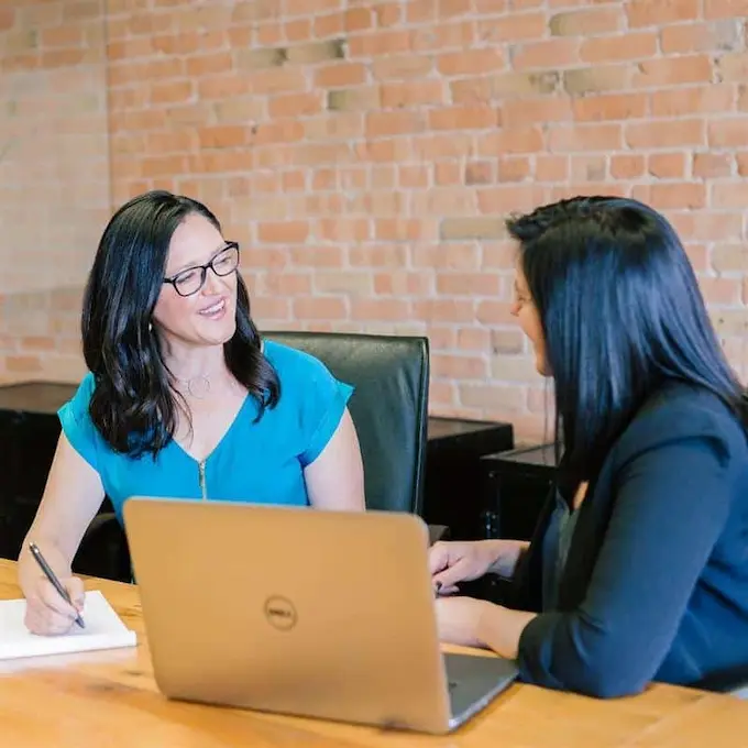 Solicitor explaining settlement agreement details to client