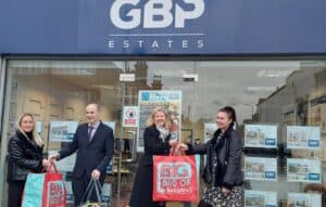 Jo and Paul present toys to GBP Estates for Give a Child a Christmas Campaign