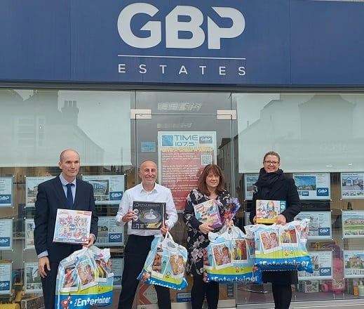 Paul and Jo W from Mullis & Peake present toys to GBP Estates for their Give a Toy a Christmas Campaign