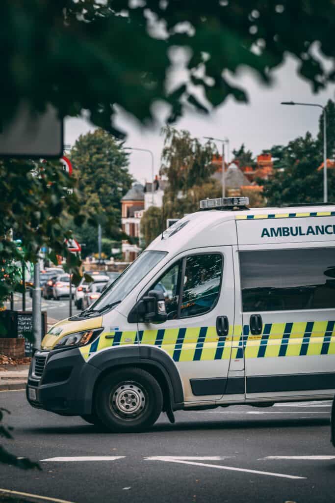 Ambulance driving past on the road