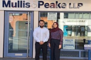 Shah and Hazara outside Mullis & Peake Romford office
