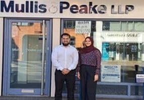 Shah and Hazara outside Mullis & Peake Romford office